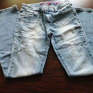 2 pairs of used size 5 jeans
